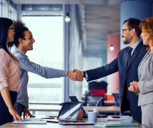 multiethnic-business-teams-meeting-room-shaking-hands-handshake-two-men-toned-concept-multiethnic-business-teams-meeting-121023407